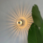 Glavira Wandleuchte mit Glas Kugel und Metallhalterung