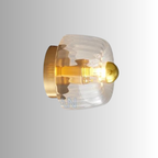 Glavira Wandleuchte mit Glas Kugel und Metallhalterung