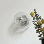 Glavira Wandleuchte mit Glas Kugel und Metallhalterung